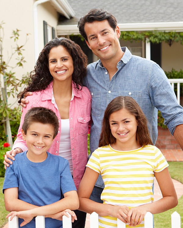 Hispanic family outside home - Mortgages By John