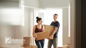 Young couple moving into new home using first-time home buyer programs in 2026